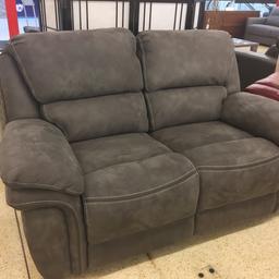 Bergamo grey alcantara leather 2 seater manual recliner sofa. Very comfortable sofa,perfect for any room.