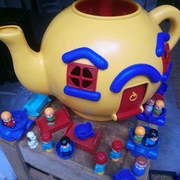 vintage bluebird yellow teapot with lots of figures ,cars chairs etc