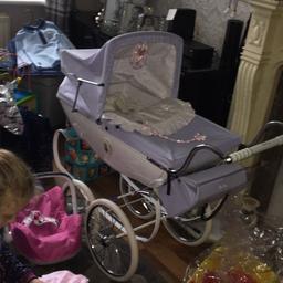 Silver cross dolls pram like new bought last Christmas and has been out the house literally twice this is the limited edition version Lilac colour comes with bag quilt pillow beautiful pram would make a lovely christmas present height 26 inch length 28 inch again Condition is like New.
