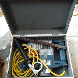 One chisel.  No drill bits.
Used condition.
Working order.
Collection only.
Cash offers only.