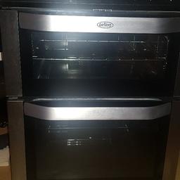 black and silver 60 cm duel fuel top and bottom defrost A+ rated fully working ,automatic cut out easy clean enamel ovens ..ovens both fan assisted.wxcellent  condition 140