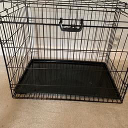 Dog crate medium size excellent condition only used for a month - folds flat 
Dimensions 75 cm wide
60 cm height 
53 cm depth
