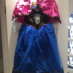 Brand new with tags FROZEN dress age 5-6. Comes with a clip on button that plays theme tune. Beautiful sparkly dress with detail and pink cape. 

COLLECTION ONLY FROM SWANLEY