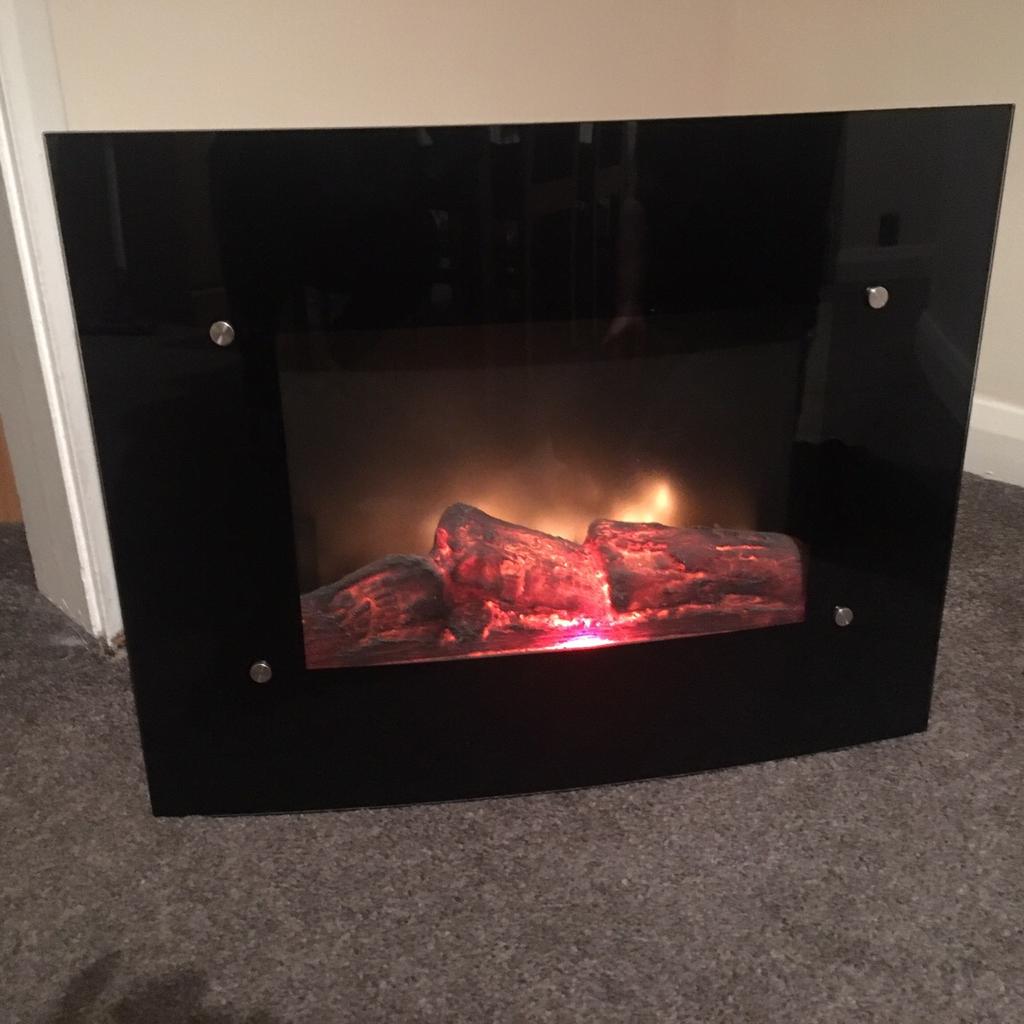 Large wall mounted electric fire log effect in S60 Rotherham for £15.00