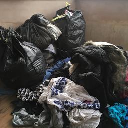 Huge joblot all clothes practically brand new with tags  dome without their jeans tops jumpers dresses bedding towels  fancey dress costumes  skirts sheets will do well at carboot... will need a good wash as been in storage.... open to offers want gone today... 7 big black bags in total