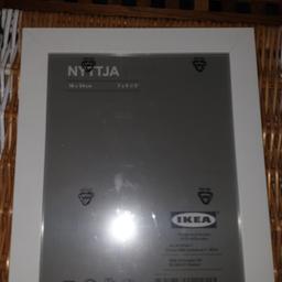 white ikea picture frame. never been used and in original packaging. 50p.