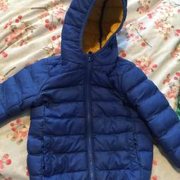 Next boys winter coat 12-18 months. Yellow lining. In a very good condition. From a pet and smoke free home.
