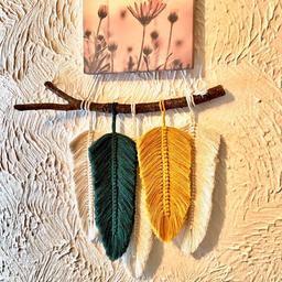 Boho style handmade Macrame Feather Wall hanging . Elegantly made using wood and cotton cord.
Free postage to anywhere in UK
