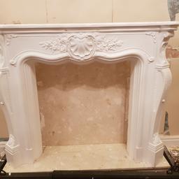 plaster fire surround.
some minor damage.
must be collected