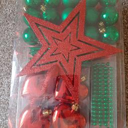 Red and Green Christmas Decorations. Brand new in sealed packaging. Includes baubles, star, bead garland, etc. Collection from WV8 area. I can post if you are not local. Please note I am only accepting the asking price of £2.