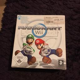 Mario kart for the Wii , game and wheel 
Collect only