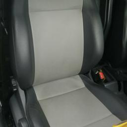full leather/vinyl front seats. Immaculate condition, easy upgrade and easy to keep clean. Dark and light grey. Also have the built in storage box under the seats. Ready to bolt in.
