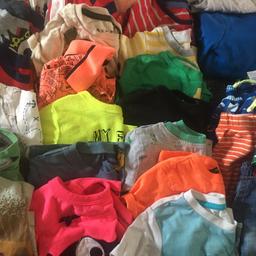 25 t.shirts
1 Blue jumper 
1 shirt 
1 denim shorts 
1 orange shorts 
2 swim shorts 

Bargain