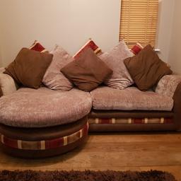 Brown toned faux suede and material coverings, red and gold strips to cushions ( I turned them around so they were just plain brown). Measurements are: Width arm to arm 243cm. Depth 96cm lounge extend depth 147cm. Collection anytime from now Farnborough Hampshire.
