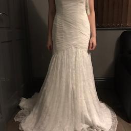 Brand New Wedding Dress with tags still on never been used. Size 8, laces up at the back, Lace material. Brought for £495 selling for £400.

Collection Only