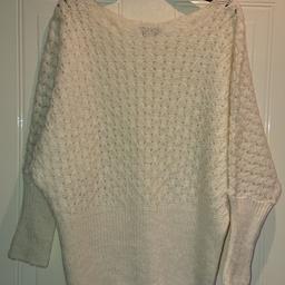Ladies Jane Norman Cream Jumper Size 14 see through front and back never been worn. Immaculate condition. Please take a look at my other items for sale as I'm having a big clear out due to expecting a little one.