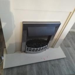 Cream fire Place, as you can see from pitcures child has drew on it an it is worn.. Good to anyone who can do it up or just starting out.. Works perfectly blows out heart an has light
