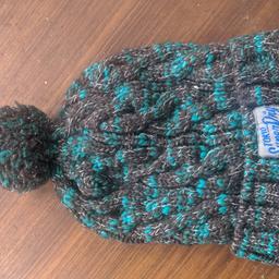 Superdry 
bobble hat 
winter/ ski style hat 
used only a few times