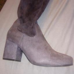 Grey long over the knee tie up suede boots.
Size 7 UK
Great condition