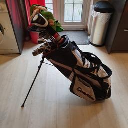 this is a full set of golf clubs , with Callaway black legacy irons, toe up putter and titleist driver and woods. 
DA7 area , collection only