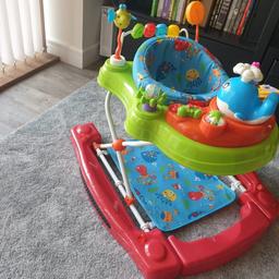 6 in1 game centre. plays music. lots of toys. one of the best walkers around. excellent condition as hardly used