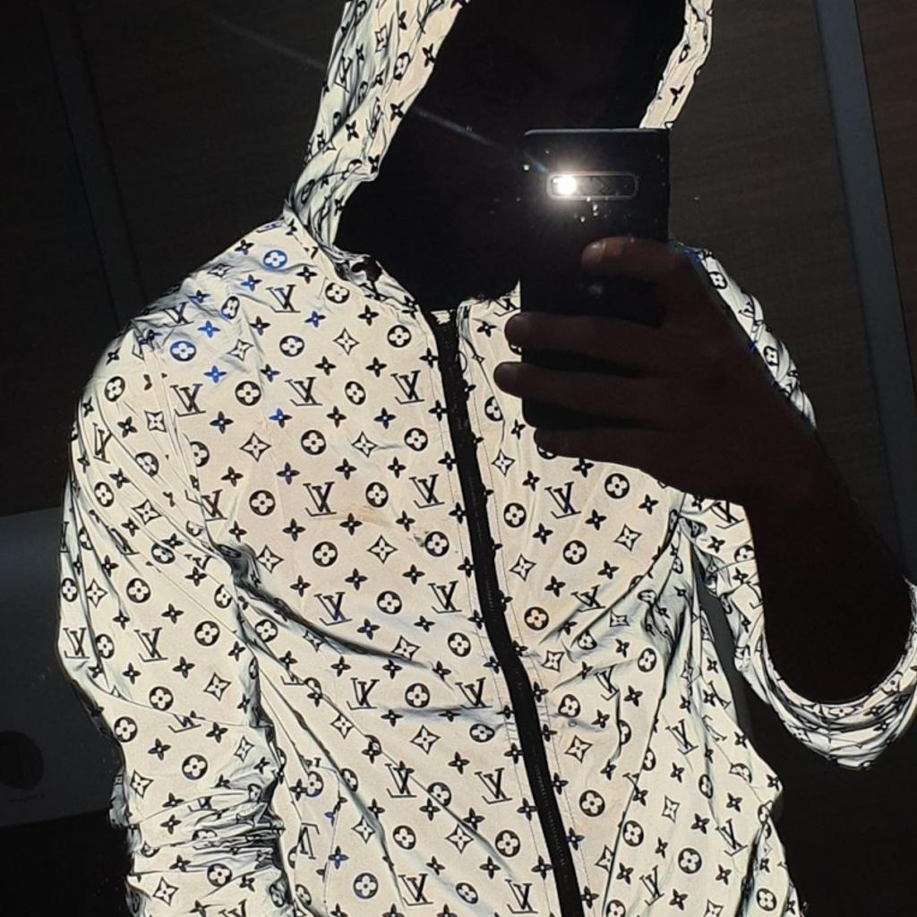 Reflective lv store jacket