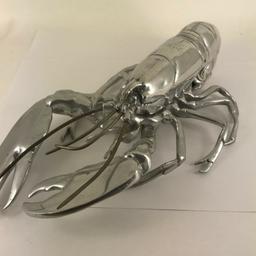 This Pewter Lobster has undergone a thorough inspection to ensure all aspects of the item are as they should be to meet our high standards for sale.
 It has been referenced against records and registers to help determine a clean history and its authenticity.

Approx 12 x 8 Inches