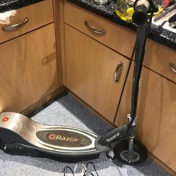 Twist throttle, in working condition. Charges and accelerates if no weight is on it, easily repaired, needs battery replacement which is around £25 online.