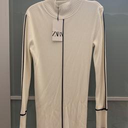 I’ve never worn this beautiful dress from Zara. It sold out very quickly and in popular demand! Size Large - however it is quite fitted. Long high neck knit dress with long sleeves. Contrasting strip detail.