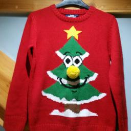 THIS LOVELY RED CHRISTMAS JUMPER PLAYS XMAS TUNES WHEN PRESSED.

SIZE 10/11 YEARS.

GOOD CONDITION.

FROM SMOKE AND PET FREE HOME.