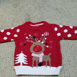 THIS  GORGEOUS XMAS JUMPER IS IN 100% COTTON.

SIZE 12 - 18 MONTHS.

RUDOLPHS NOSE LIGHTS UP WHEN PRESSED.

IN GOOD CONDITION.

FROM SMOKE AND PET FREE HOME.