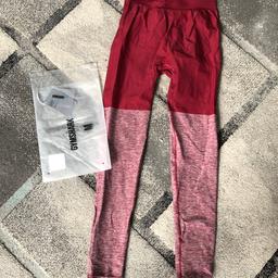 Gymshark women’s leggings size M 12/14 I would say 
Only worn once 
Fabric is beautiful thick 
In colour beet/beet 
They don’t fit me well hence selling  , the leg is quite long and I’m 5ft 3 
Comes with original tags and bag as seen in pics 
Collection n193bq 
NO TIME WASTERS PLEASE