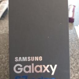 silver Samsung galaxy edge in original box no scratches or Mark's front or back as case been on looks brand new