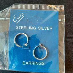 Silver Hoop Earrings. Brand new in sealed packaging. For pierced ears. Size approximately 1.25cm diameter. Collection from WV8 area. I can post if you are not local. Please note I am only accepting the asking price of £1.