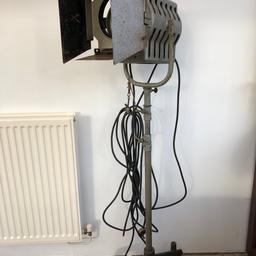 Working condition industrial floor lamp. 

Features a tripod base on wheels. 

Ideal for a up cycling project or if your looking for an industrial style. 

Adjustable height. 

The head of the light measures 19’’x12’’

The height of the light itself is 59’’

Collection from Stone, Staffordshire only.