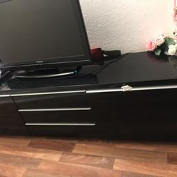 free Ikea Tv stand .got little dent ,damaged by glue.but got glass cover ,won’t notice much .size 180cmx40cmx48cm .collection only. Thanks