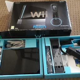 Only used twice. 
Includes console, 1 controller, 1 num chuck, spare grip and Wii resort game.
In original box.
Collection only.