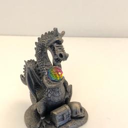 Lovely little figurine, plenty of detail on the dragon holding his crystal.

Collection only