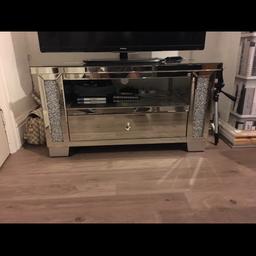 Hi I'm selling my TV stand had it 6 months fits up 42inch I've just got a 65inch an had it put on the wall I'd swap for a mountain bike or a drill paid 300 ment to be 350 or an sander or the cashcash the wall