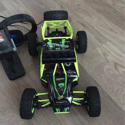 Remote control car goes up to 30MPH bought for 130 looking for around 60 as it's hardly ever been used it has bright head lights suspension head phones and remote basically brand new box also with it perfect for a Christmas present