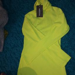 Neon yellow high neck long sleeve top 
Pretty little thing 
Size 14 
Brand new