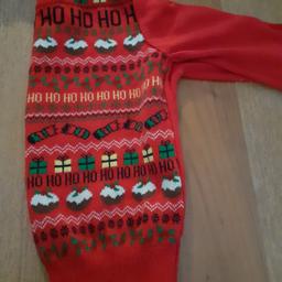 size 4-5. worn once. lovely soft jumper with nice festive pattern.