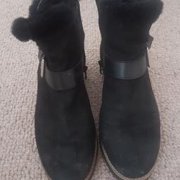 cost boots with fur round the top. excellent condition. size 5 from dune