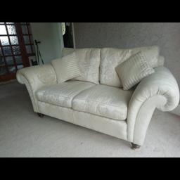 2 seater sofa with wood cast legs in good condition few small marks no rips