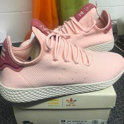 Brand new with tags and box
Size 7 (adult) 
Ice Pink & White