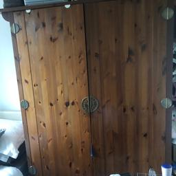 Dark wood wardrobe, bottom drawer sticks and needs repairing. Perfect for an upscale project. Will be dismantled for collection. Can be seen assembled at the moment though. Must be collected from Ws9