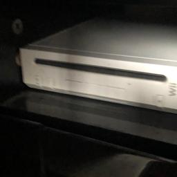 Wii console along with 81 games, box full of accessories and a wii fit board and 2 wii controllers. There is also a white stand to put the games and controllers on. Everything is very good condition.