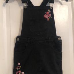 Girls aged 6-7 black dungaree dress. Excellent condition