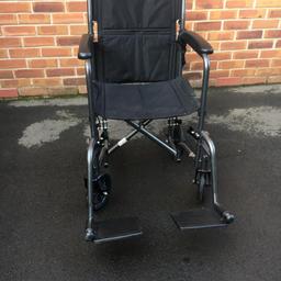 DRIVE black folding wheelchair with swing away foot rests. Used but in great condition. lightweight design makes it easy to use or push. it has a half fold back allowing easy folding for travel. It has padded arm rests. Steel frame, easy to apply brakes, solid tyres and nylon seat and back makes this a very low maintenance chair, which is easy to keep clean.