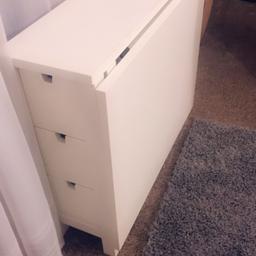 White folded table from IKEA in good condition selling due to bought  new table , very heavy and sturdy